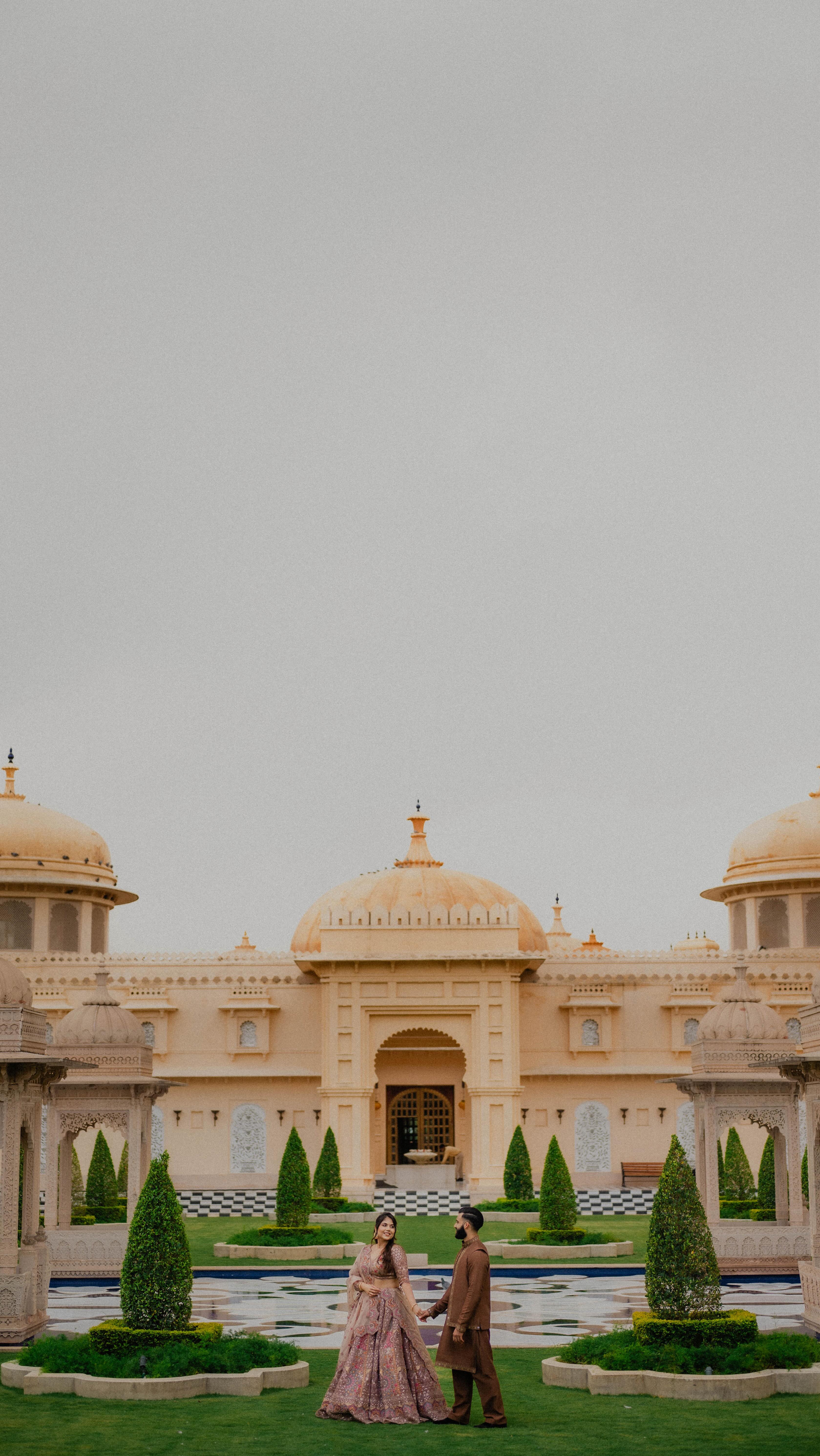 Radhika & Dhyeya chose Udaipur for their pre-wedding as a way to bring a sense of heritage and history into their wedding celebrations that would later unfold in the United States. Set between the quiet grandeur of The Oberoi Udaivilas and the calm of Lake Pichola, their vision of a prewedding was thoughtful, refined, and deeply personal.

Location: @theoberoiudaivilas 
Photography & Film: @dreamcatchers.photography.in 

[Dreamcatchers Photography by Punit, Preweddings in India, Elopement Photography, Luxe Prewedding, Udaipur Prewedding, The Oberoi Udaivilas]

#preweddingshootideas #udaipurprewedding #luxuryprewedding #udaivilas